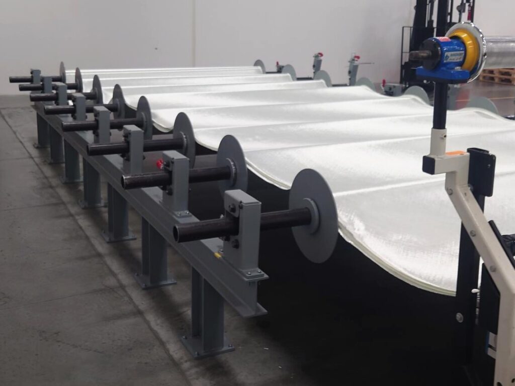 Image of a machine with shafts and rollers for material processing